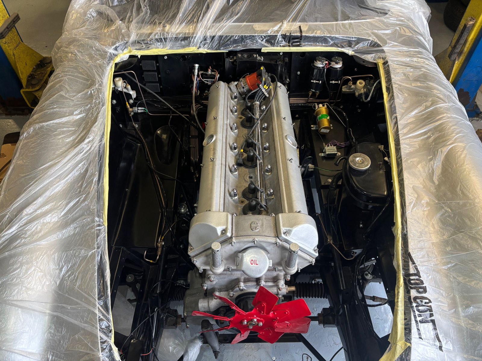 Looking down on the twin-cam in its black-painted engine bay.