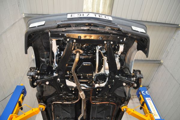 The underside after its anti-rust treatment, on the lift.