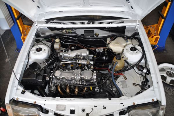 The rebuilt fuel-injected engine in its bay.